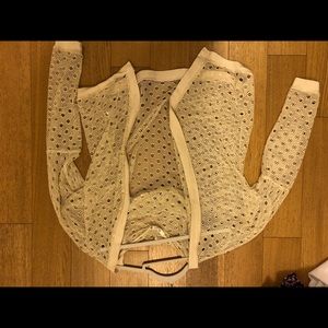 Beige cardigan with holes